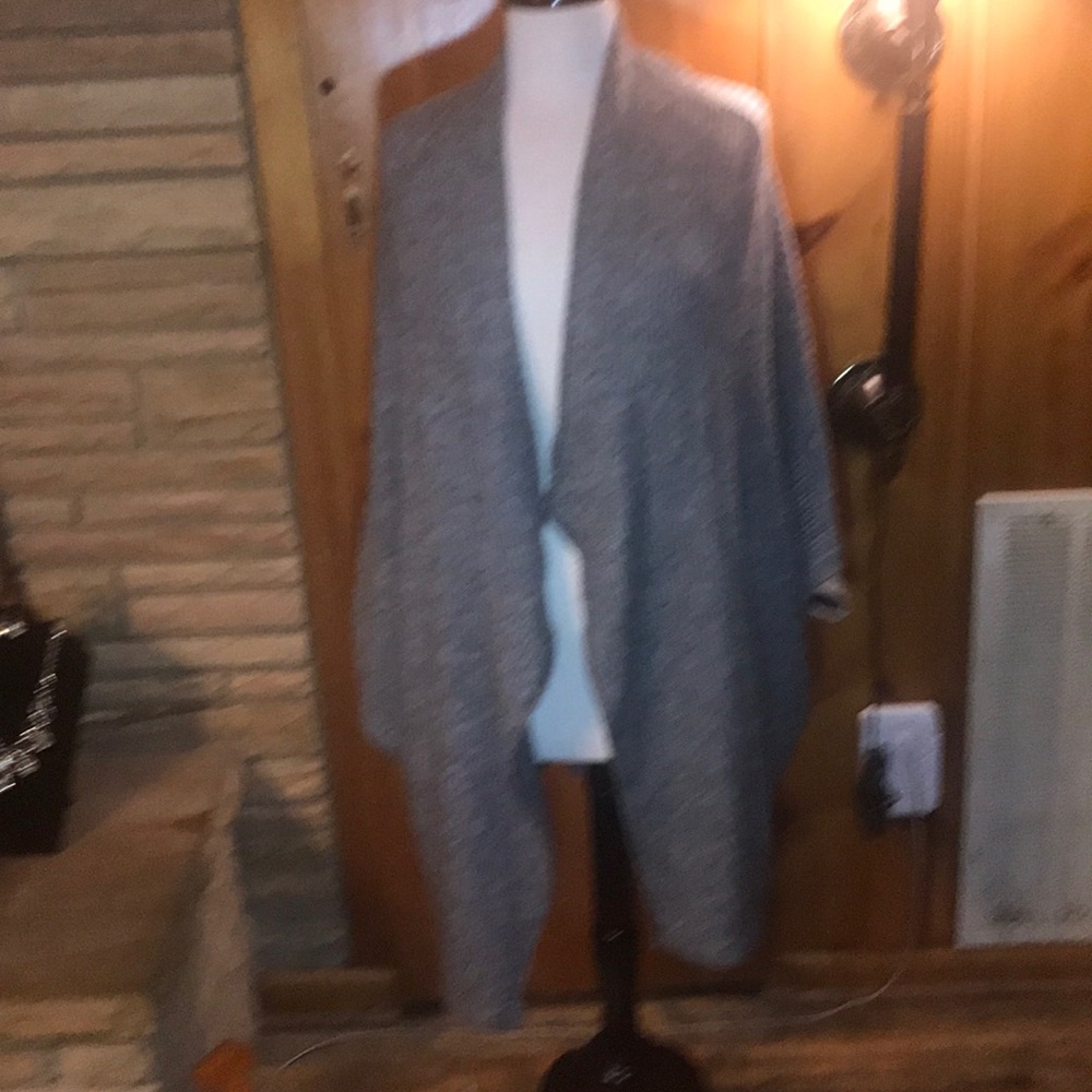 Sweater cape with Dolman 3/4 length sleeves..